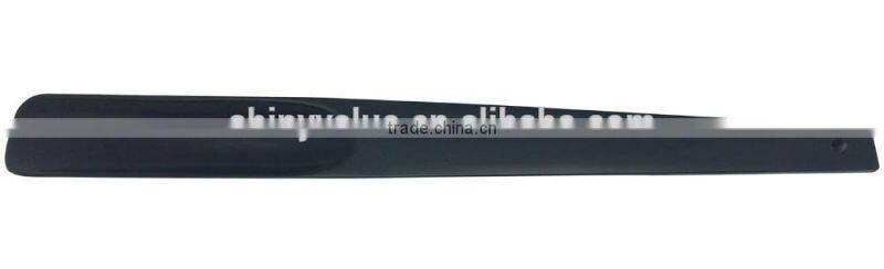 Custom color logo engraved wooden shoe hron with black strap on it