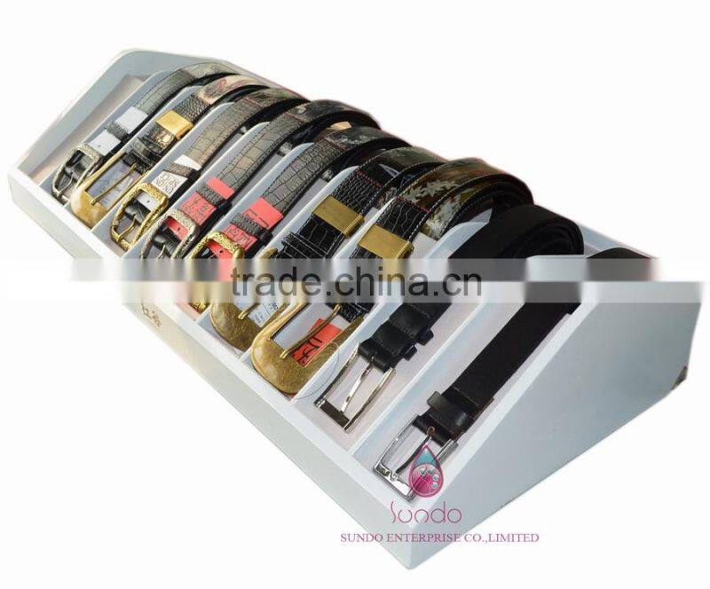 custom white lacquered wood belt display