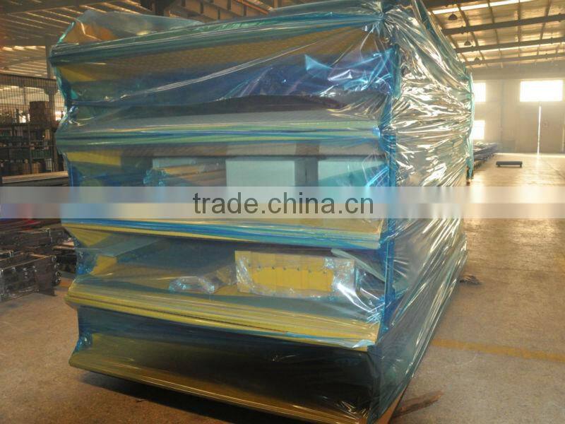 Hydraulic low ceiling tilting car stacking lift