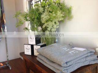 Organic Scented Pure Soy Wax Candle in glass jar in Salon