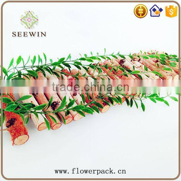 The birch stick is decorated in the garden