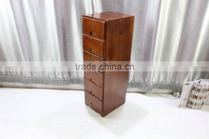Brown color wood cabinet with many drawers