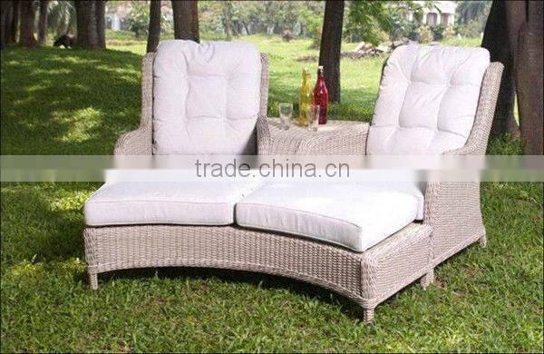 Rattan Loveseat and Footrest With Cushion