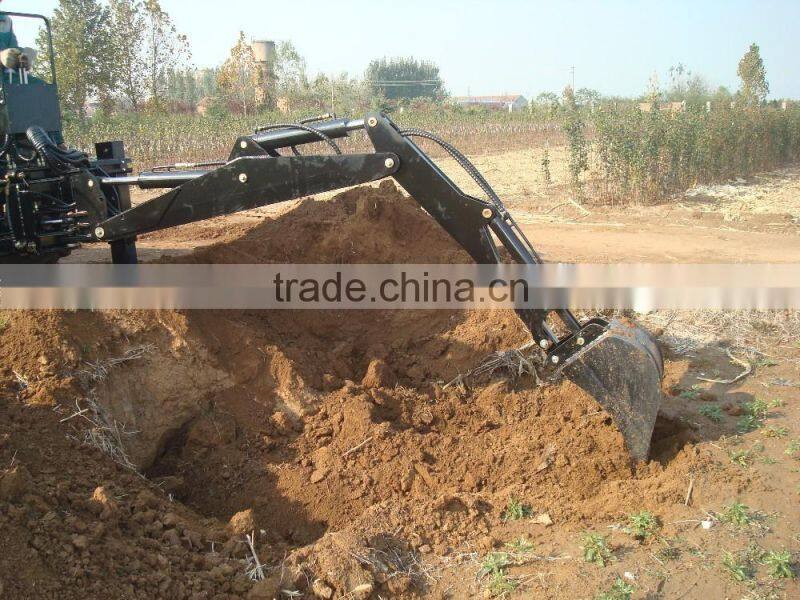 Tractor with 3 point hitch backhoe