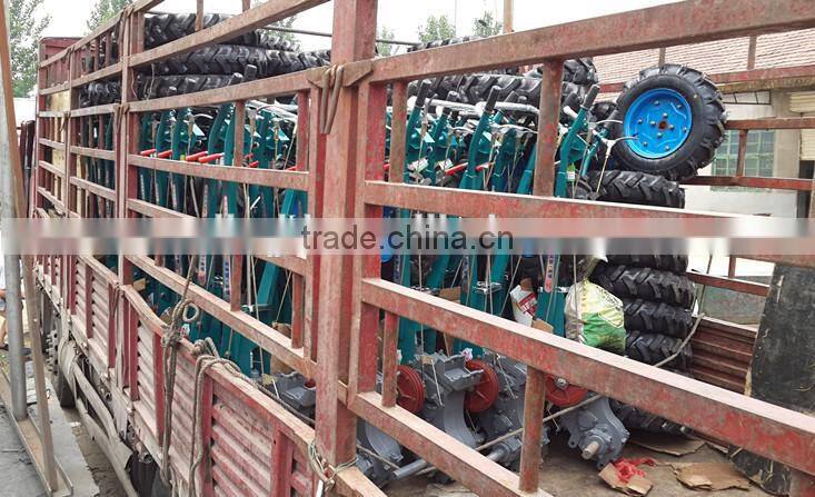 factory directly supply low price hand tractor with plough