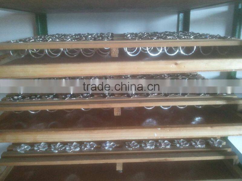 enamel coated metal alloy flower napkin ring