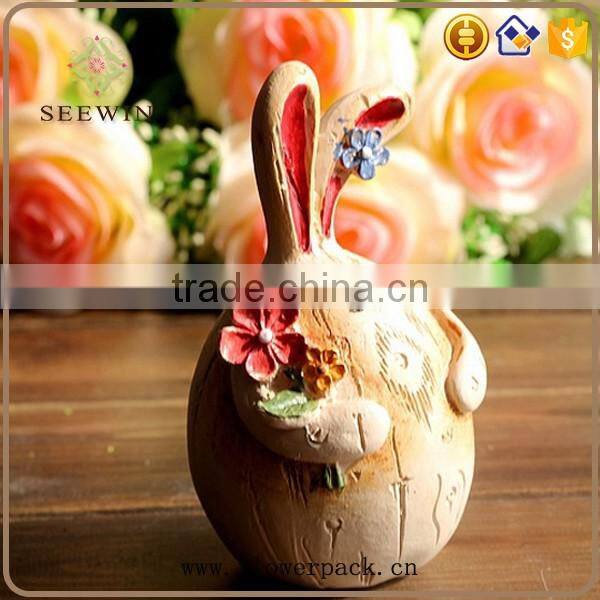 Thin rabbit rabbit couples rustic style to pick a flower