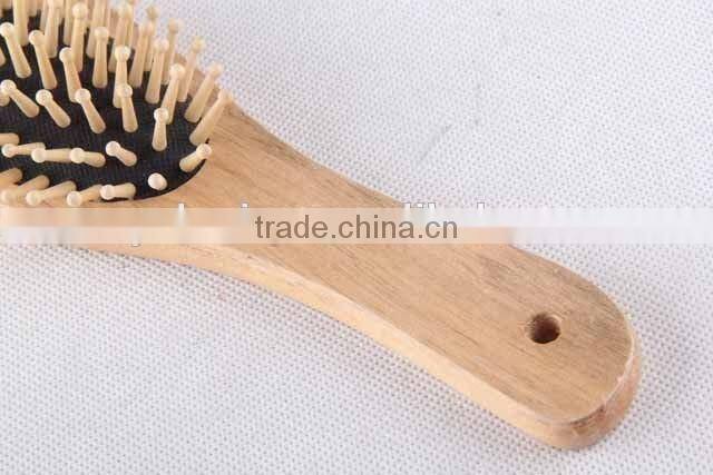 Elastic massage wooden comb with hanging hole/hair brush