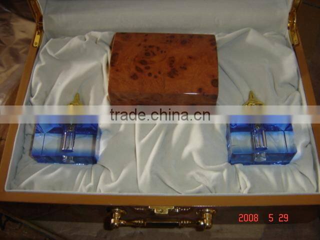 green color crystal decorative perfume bottle with golden flower