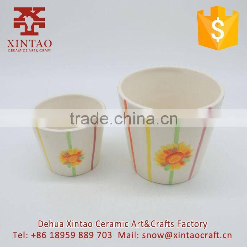 Set of 2 Colored Sunburst Design Ceramic Flower Planter Pots / Decorative Plant Container