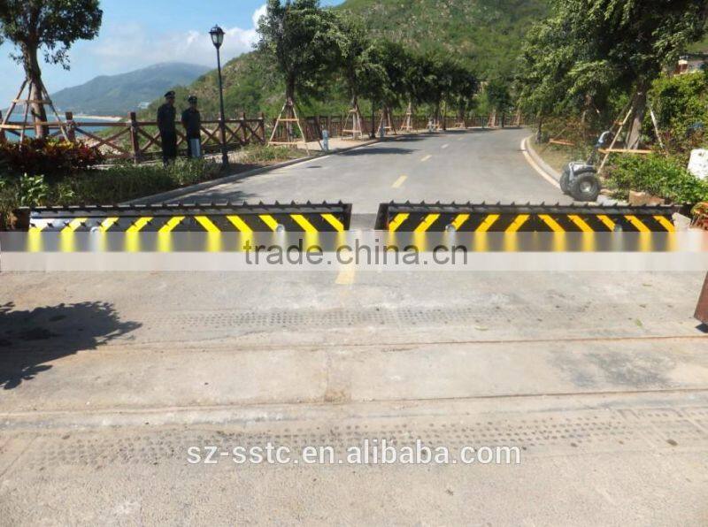Hydraulic automated road barrier