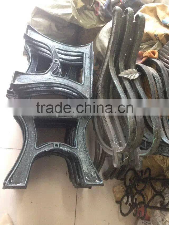 Iron legs of street wooden iron bench, antique park bench