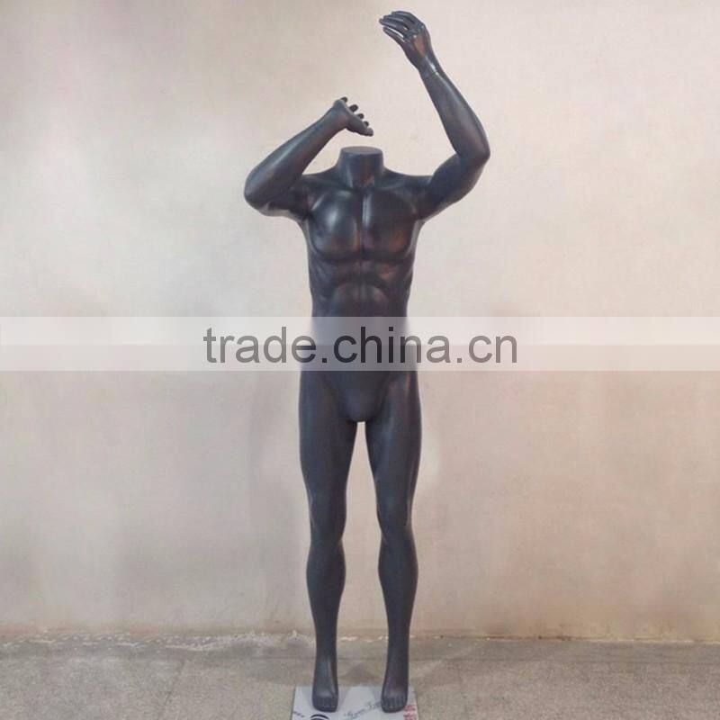 Basketball player mannequin shooting at the basket male mannequin jump shot position