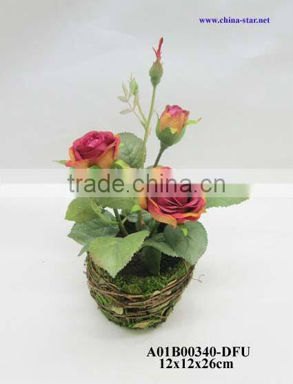 artificial rose in natural pot