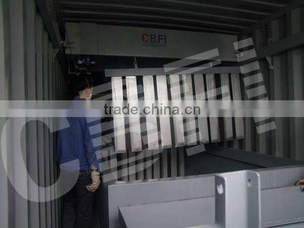 Electric containerized block ice maker for African areas
