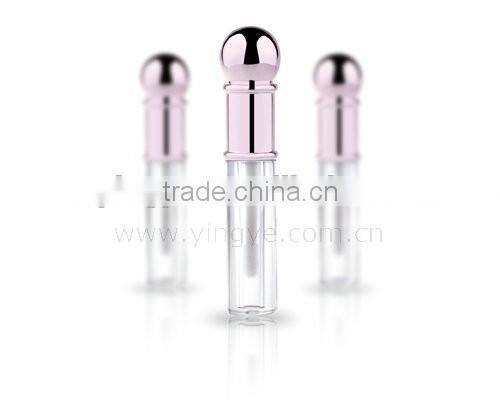 Slim gold plastic roll on lipgloss bottle