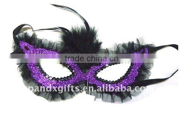 Glittered mask with feather for Carnival Party
