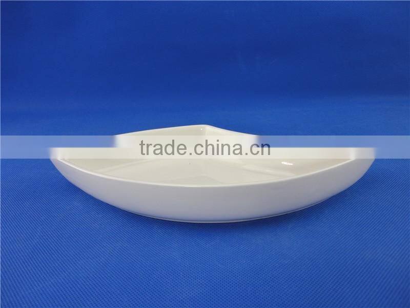 white porcelain peacock fruit dish