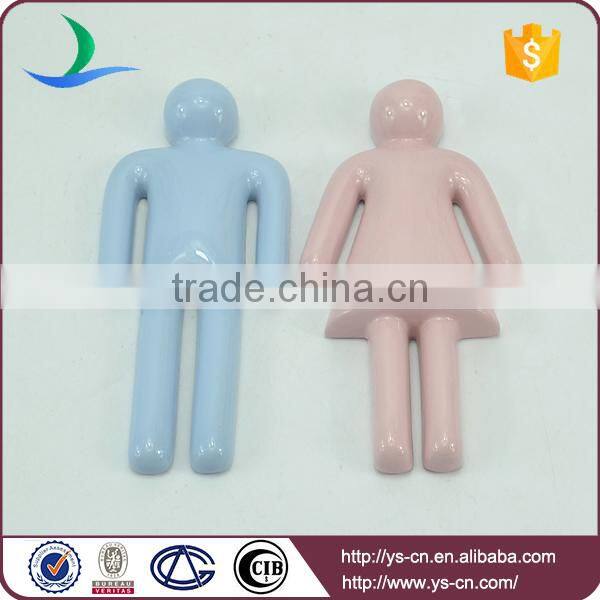 men and women shape hanging sign board for bathroom