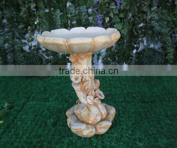 Antique fiberglass bird feeder with lotus flower design