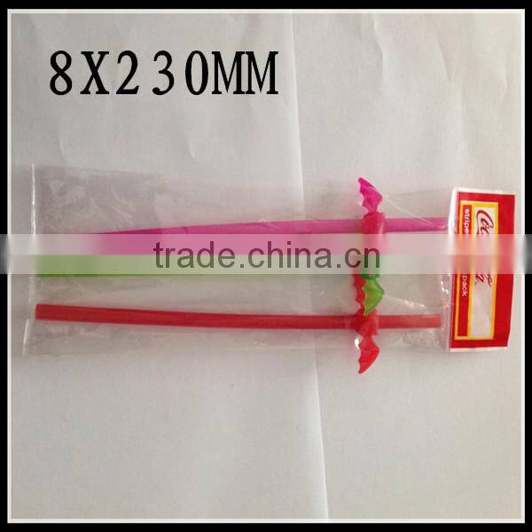 Clear wrapped red plastic drinking straw