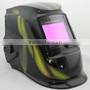 Auto-darkening welding helmet