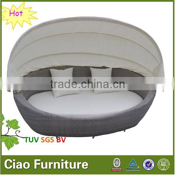 Round rattan outdoor pool bed with canopy