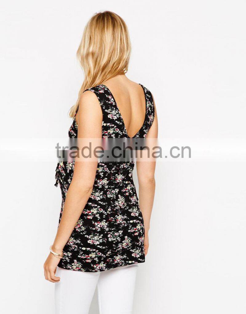 Maternity tunic with scoop neck and belt In black ditsy print clothes