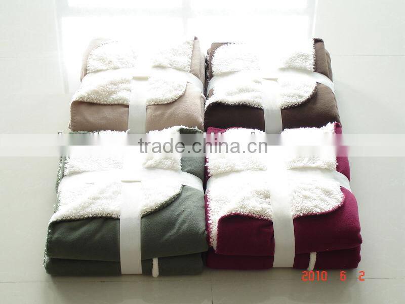 100% polyester knit solid micro fleece with sherpa throw