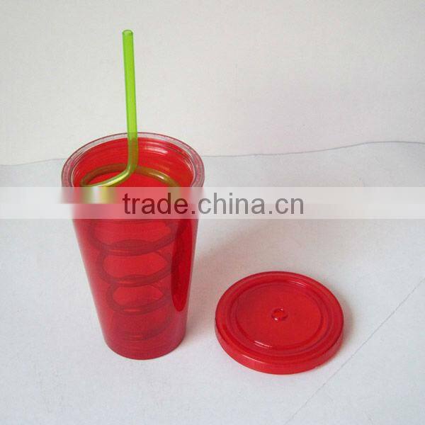 Plastic cup with lid and straw