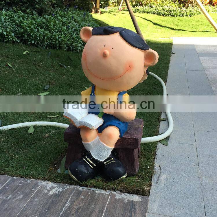 FRP student figurine in garden