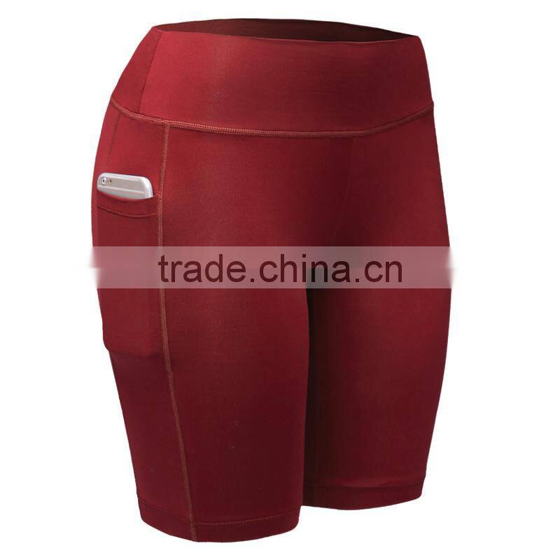 Wholesale quick dry polyester/spandex women gym sport shorts with pockets