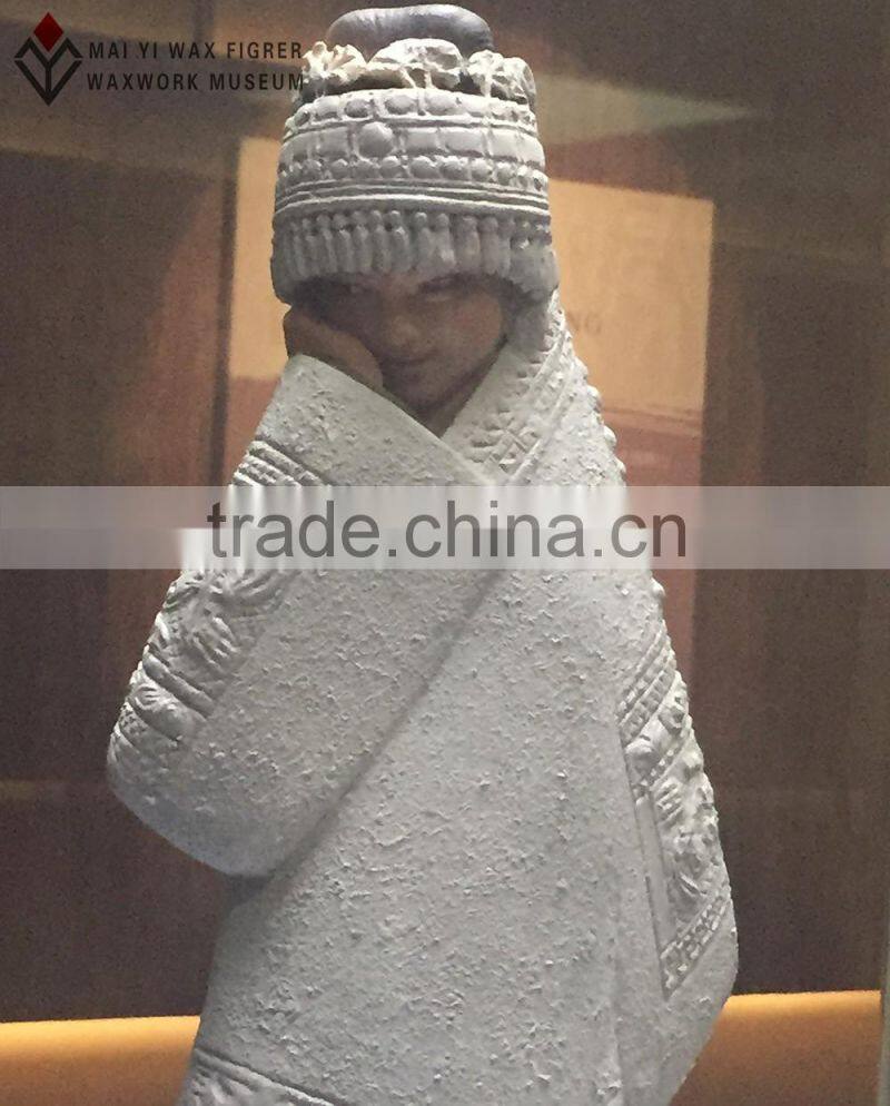 folk art sculpture of wax museum display