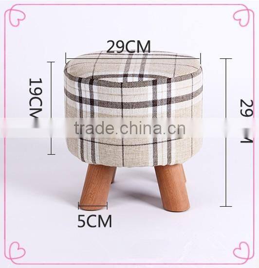 Skidproof cheap delicate refined colorful small cloth stool chair with 3 Carbonized wood legs for living room