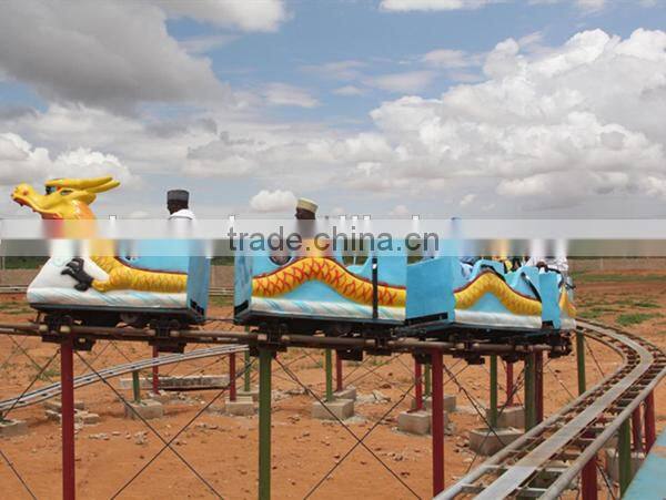 Kids large amusement rides mini roller coaster , sliding dragon / green worm mini roller coaster rides hot sale