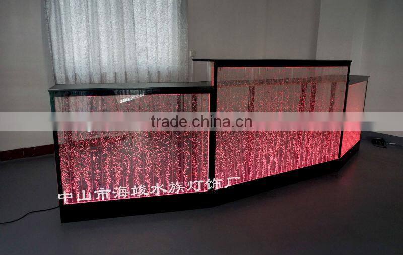 fatastic hotel frond desk receiption with led lights and water bubble moving.