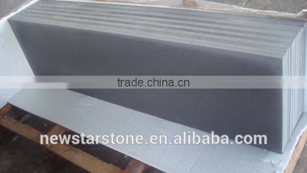 Honed grey andesite stone