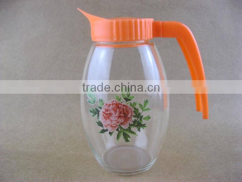 clear round glass water jug with plastic lids and handles
