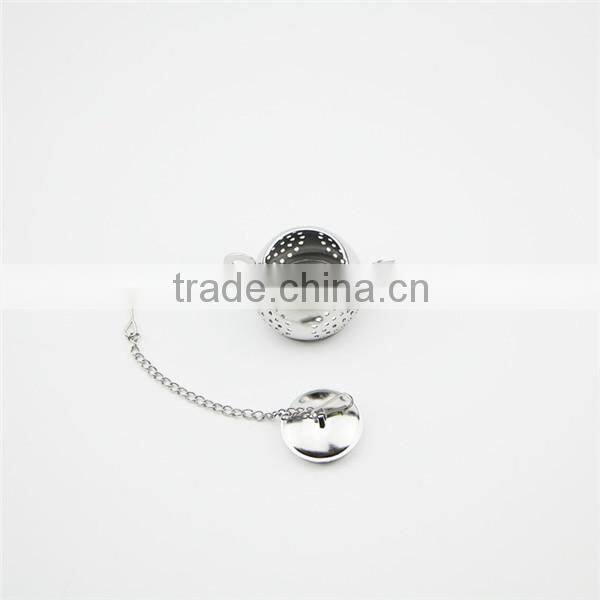 Small stainless steel teapot shaped strainer