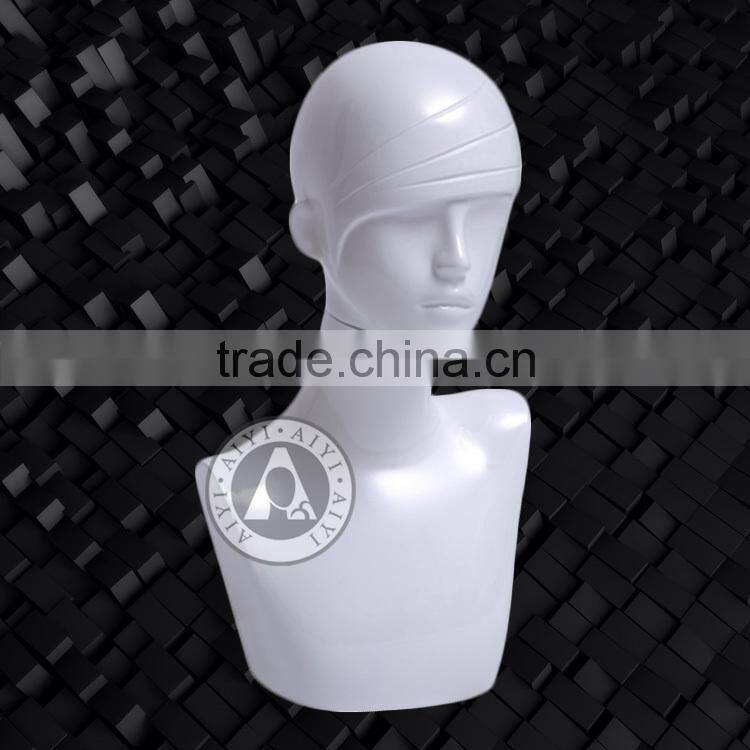White glossy female mannequin bust without head
