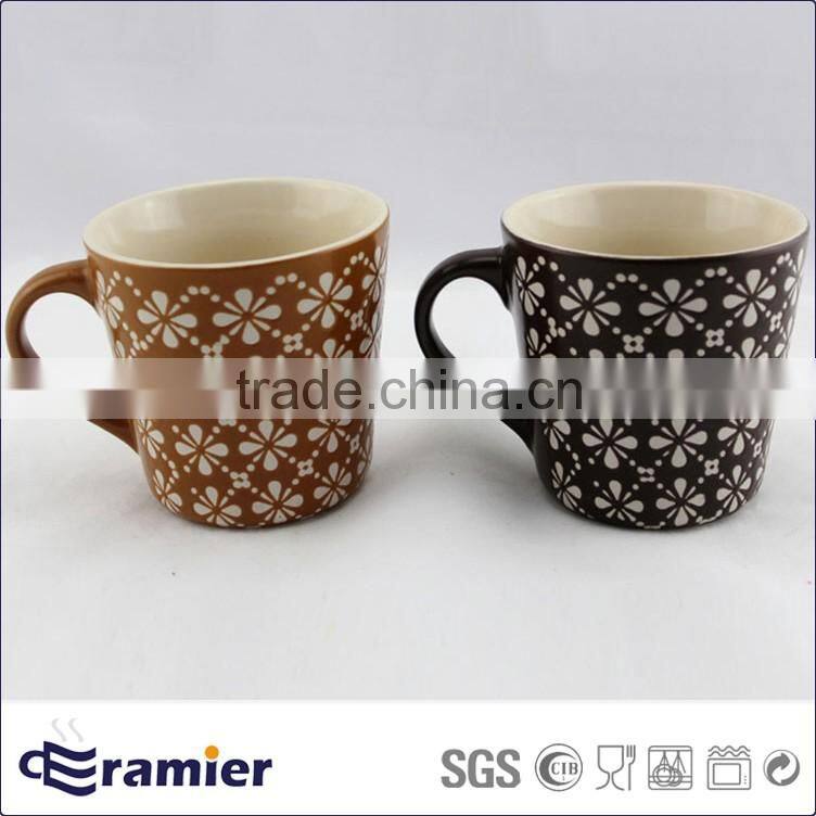 Stoneware conical shaped matte finished cups with handpainted flowers