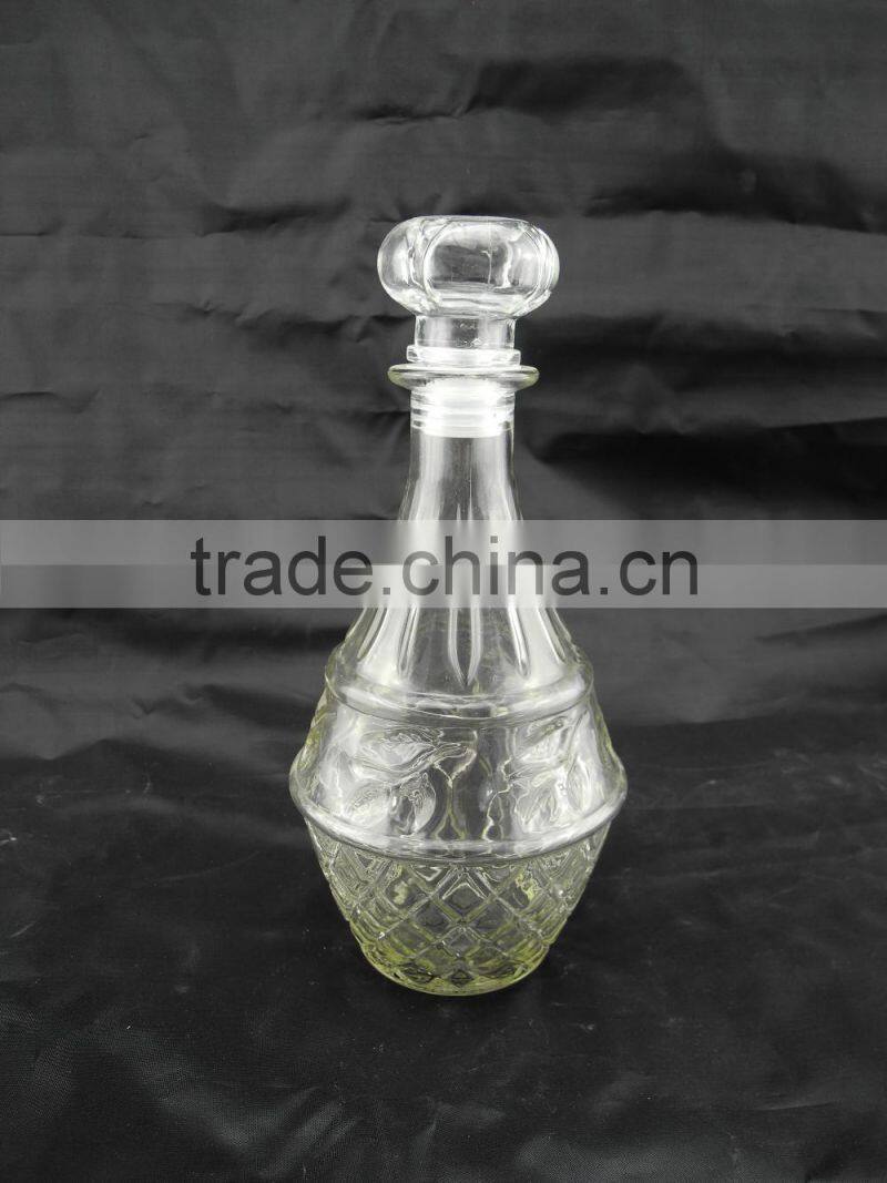 sealed clear glass drinking bottle with glass cork lid