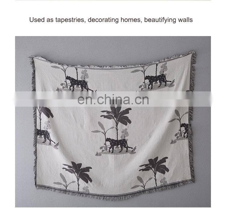 RAWHOUSE China wholesale throw blanket Yarn Dyed leopard double side woven throws tassels cover sofa home decor