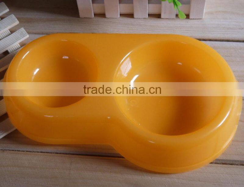 Colored plastic pet food bowl