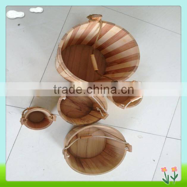 handmade wooden barrel or wooden bucket with water