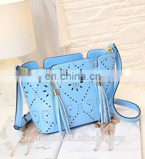 CR high reputation manufacture handbags latest model tassel bag long strap hollow pattern shoulder bag handmade leather bags