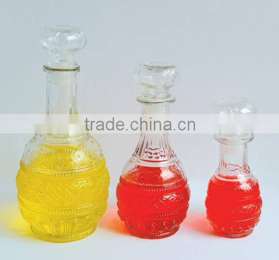 unique colored glass vodka wine bottle with glass stopper