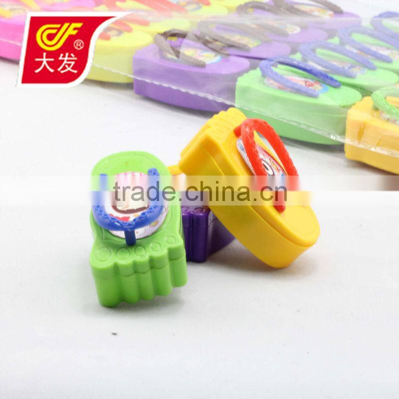 candy in plastic toy slipper