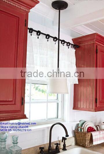 Industrial Adjustable Stainless Steel Tension Rods In The Kitchen