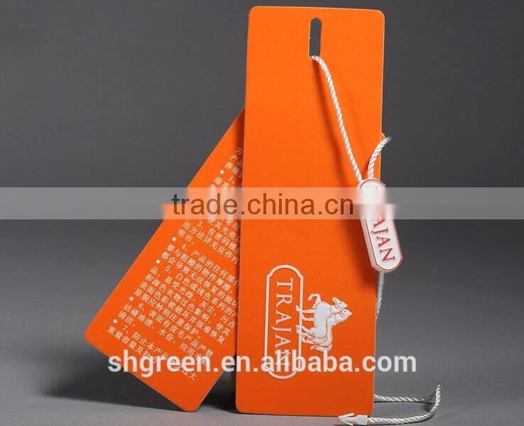 Center fold paper hangtag with plastic string tags for jeans denim